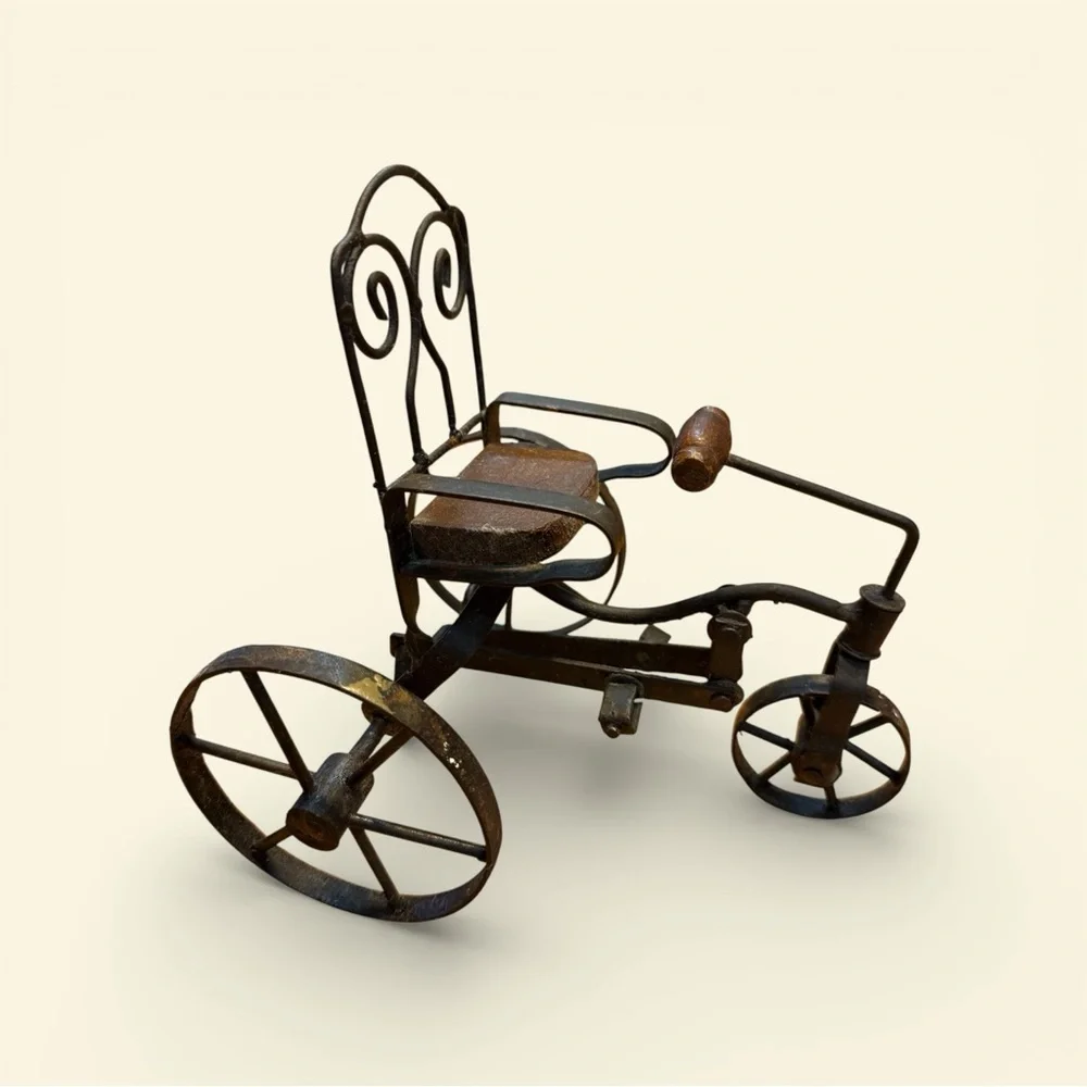Vintage or antique-style miniature tricycle. “Salesman sample”